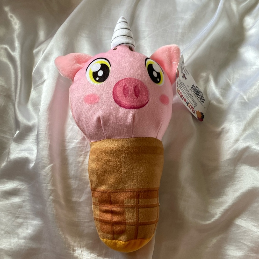Pink pig on ice cream cone